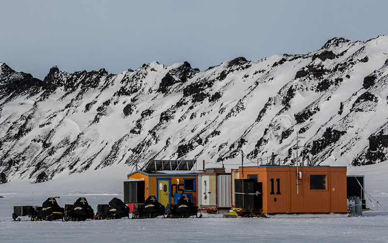 The researcher's main camp is set up on the sea ice in the lee of Big Razorback at the foot of Mount Erebus.