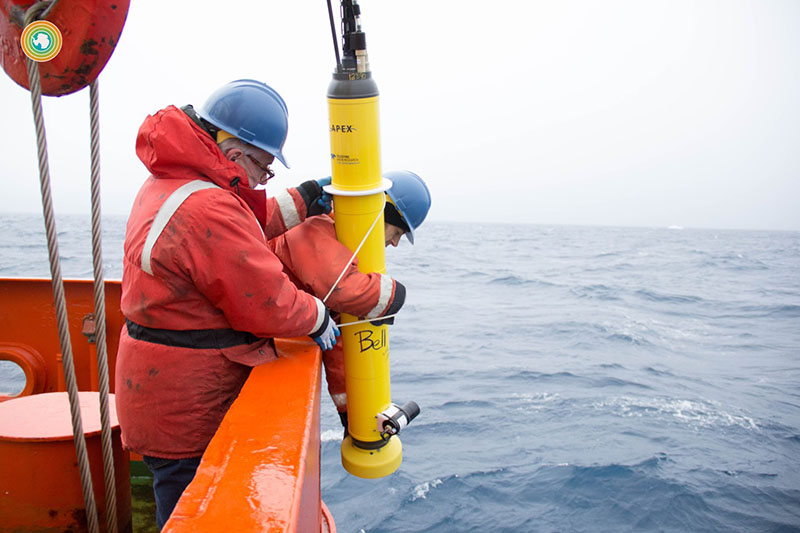Researchers deploy a SOCCOM float off the side of the Research Vessel Nathaniel B. Palmer