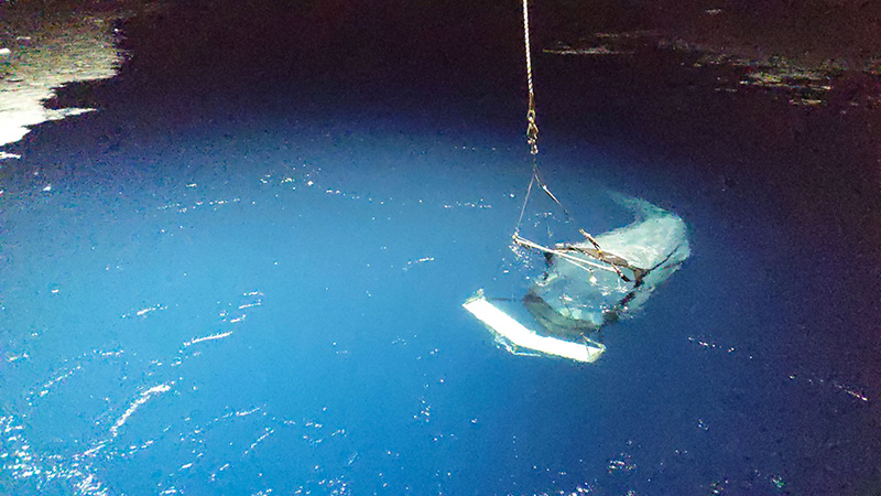 A trawl net surfaces after being deployed to collect Antarctic krill. 