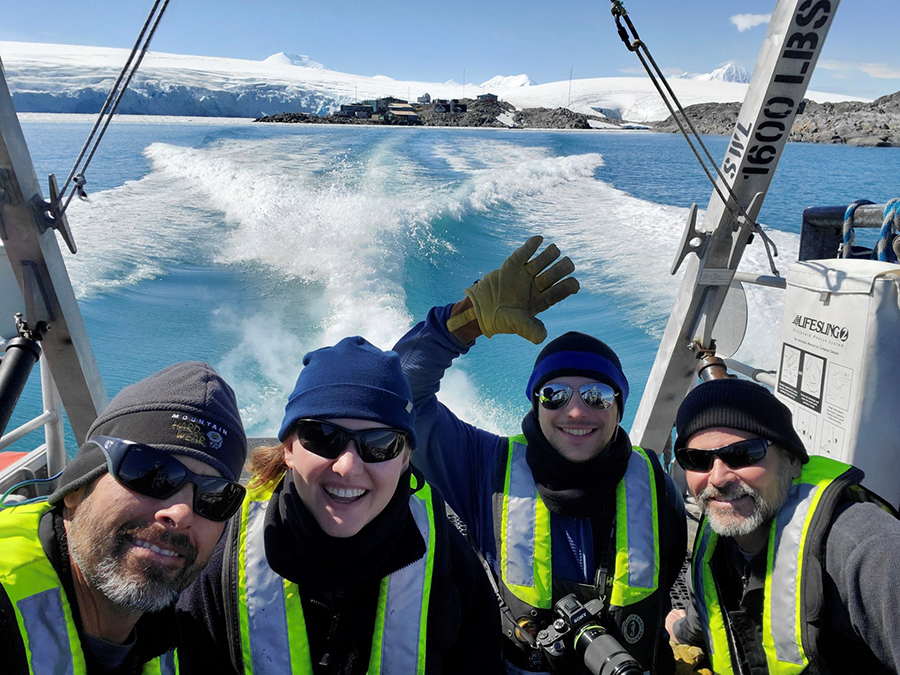 The team heads out on a boat known as a RHIB to collect samples from the Palmer Deep. (Left to right) Matt Oliver, Katie Hudson, Nick Mehmel and Josh Kohut.