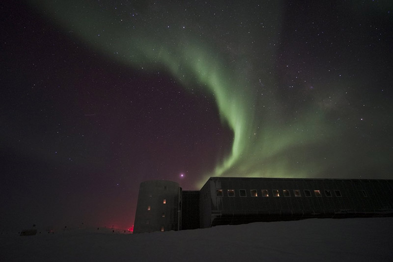 Green aurora light up the sky over Amundsen-Scott South Pole Station