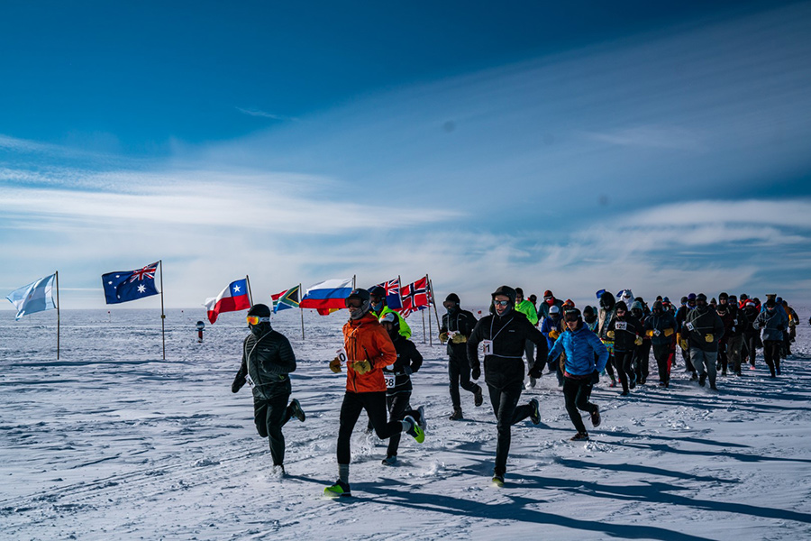 On Christmas morning, runners participate in the annual Race Around the World, a 2-mile run that takes participants around the geographic pole