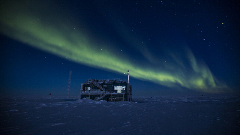 Aurora illuminate the Atmospheric Research Observatory at the edge of the clean air sector
