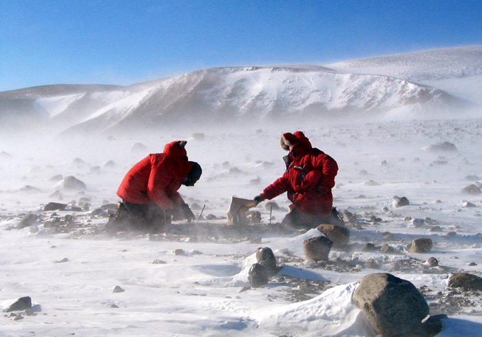 Scientists collect rocks in the Transantarctic Mountains.