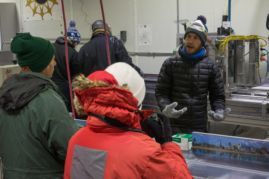 Luke Trusel of the Woods Hole Oceanographic Institute describes to School of Ice participants how he and his colleagues store and process ice cores at the National Ice Core Laboratory.